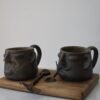 Face mug set with wooden tray and spoons