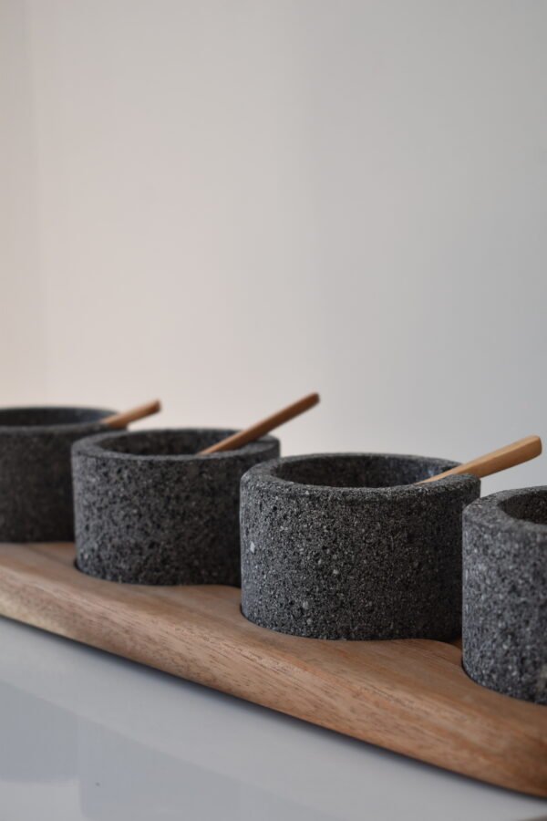 Volcanic stone condiment set with wooden tray